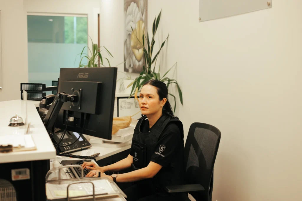 Securisquad uniformed security guard at a Metrotown, Burnaby office tower