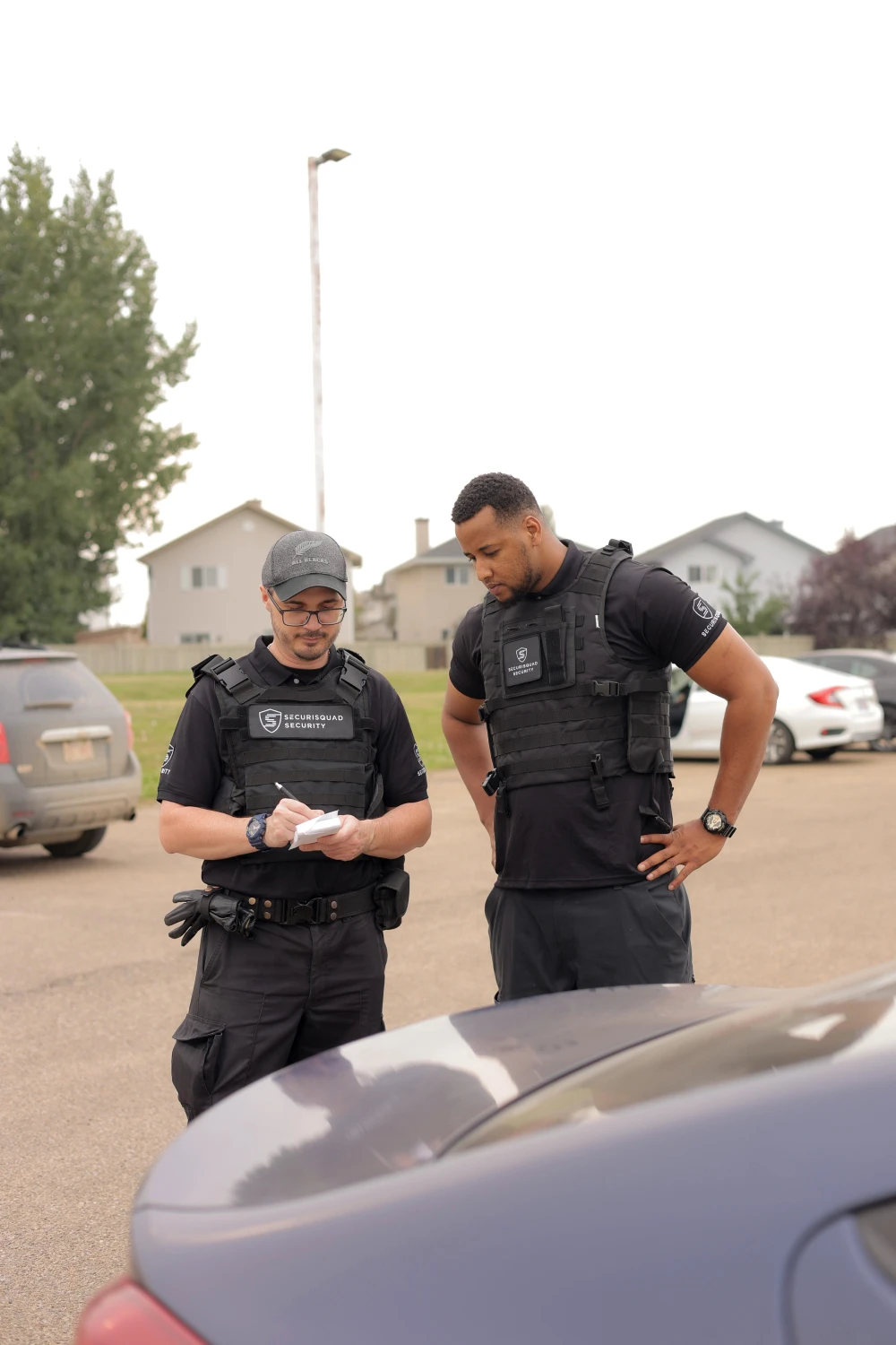 Securisquad mobile patrol security guard on vehicle patrol duty